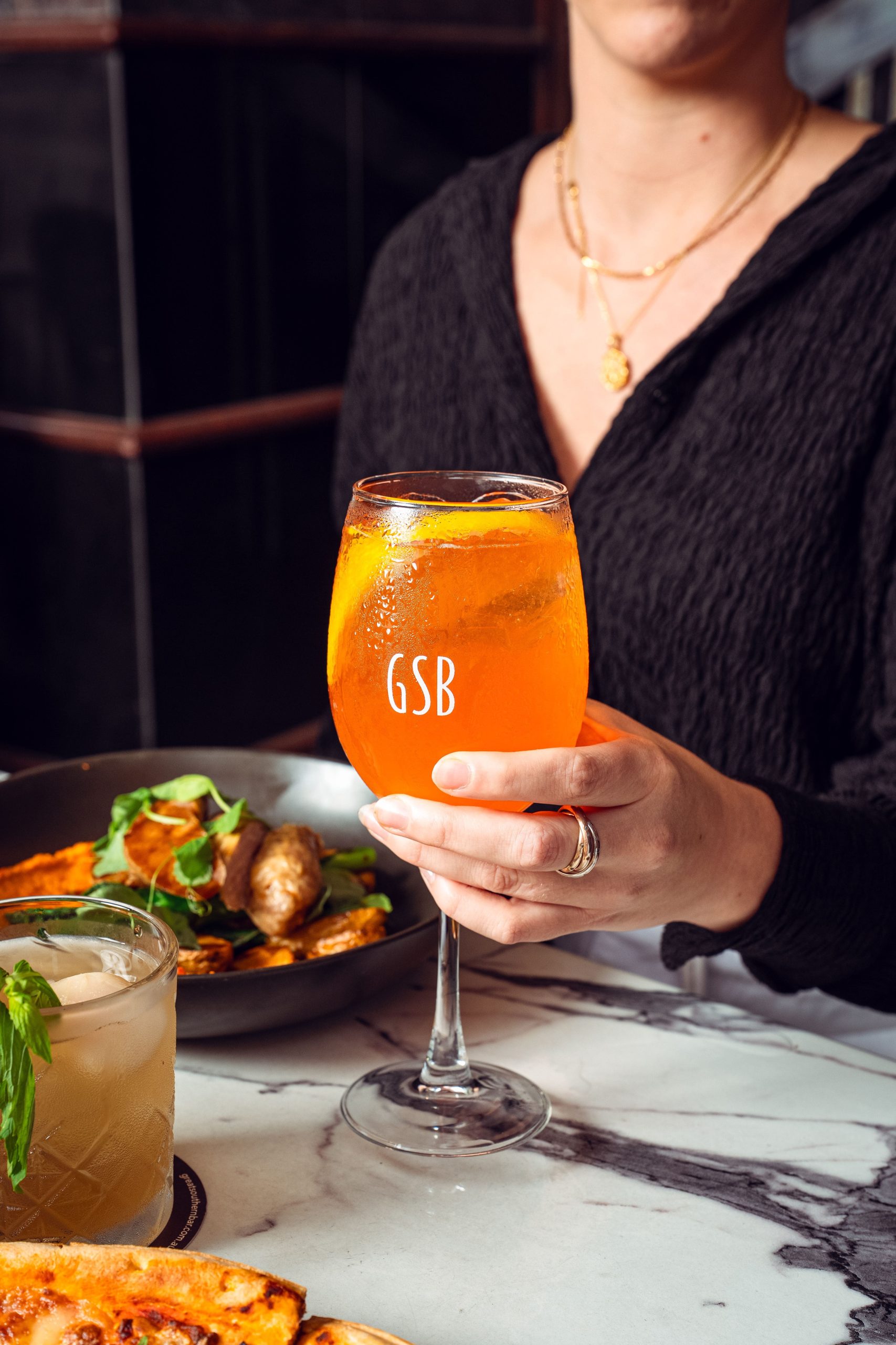 Girl Showing the Gsb Drink